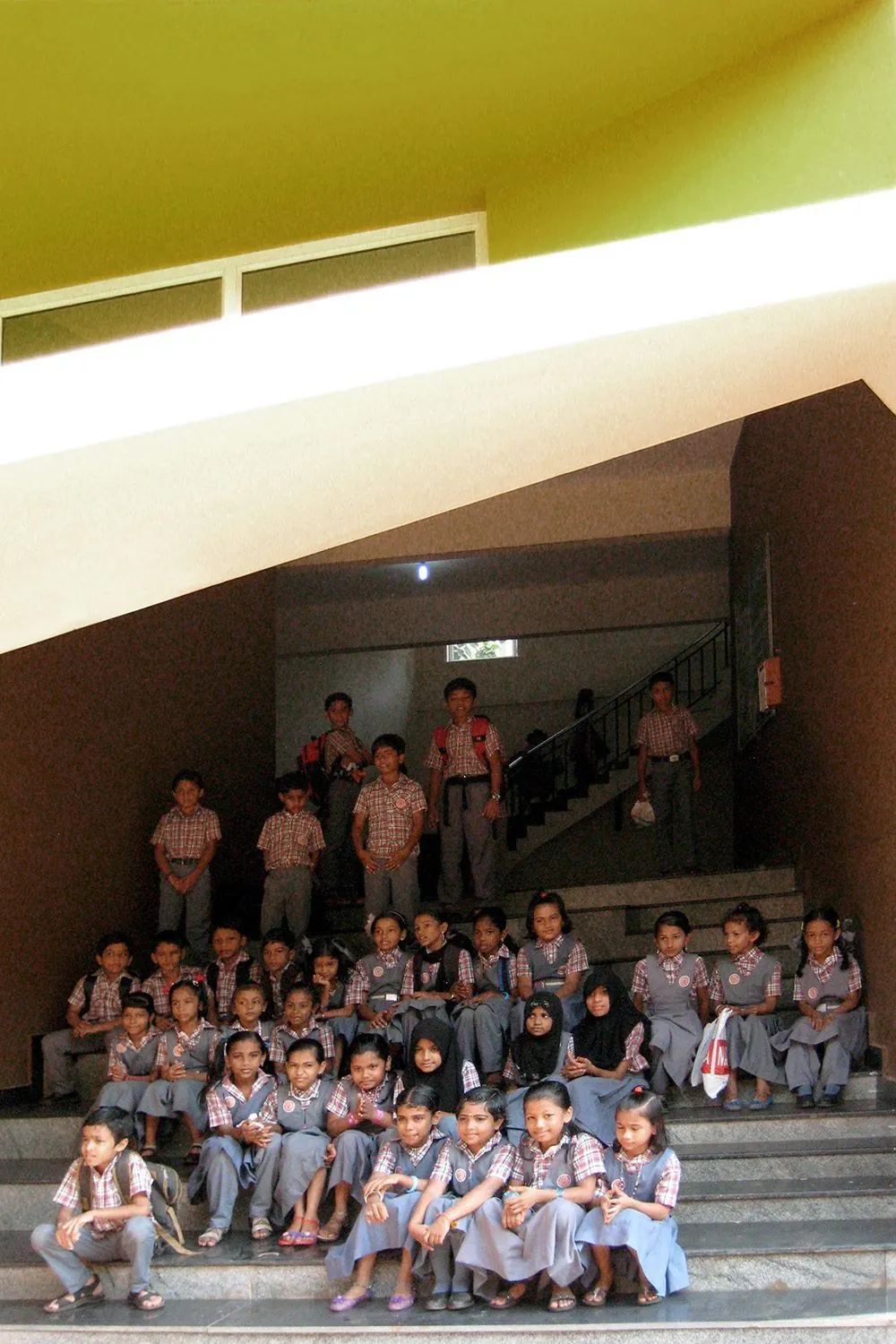 Stacked Tectonics: Pupils on the school steps