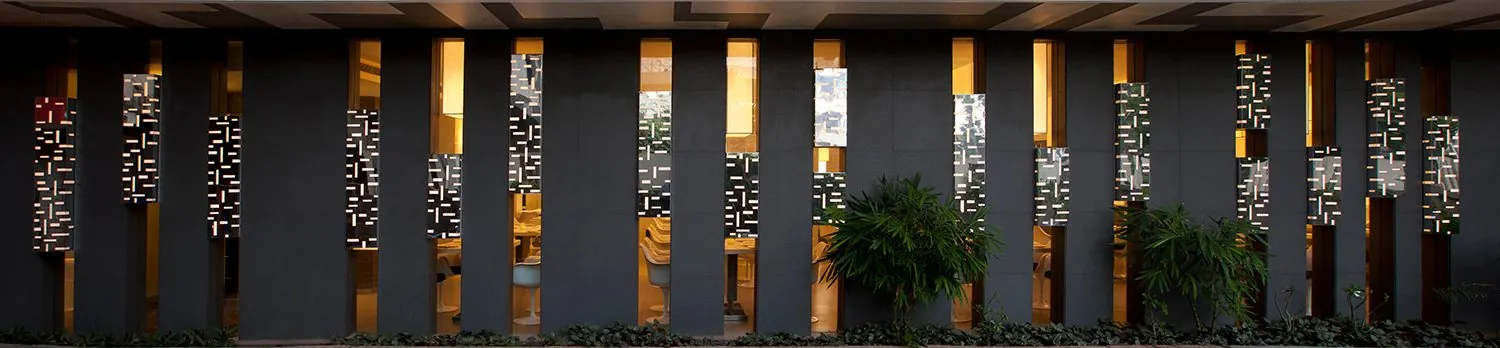 Inverted Topography: The lit façade panels